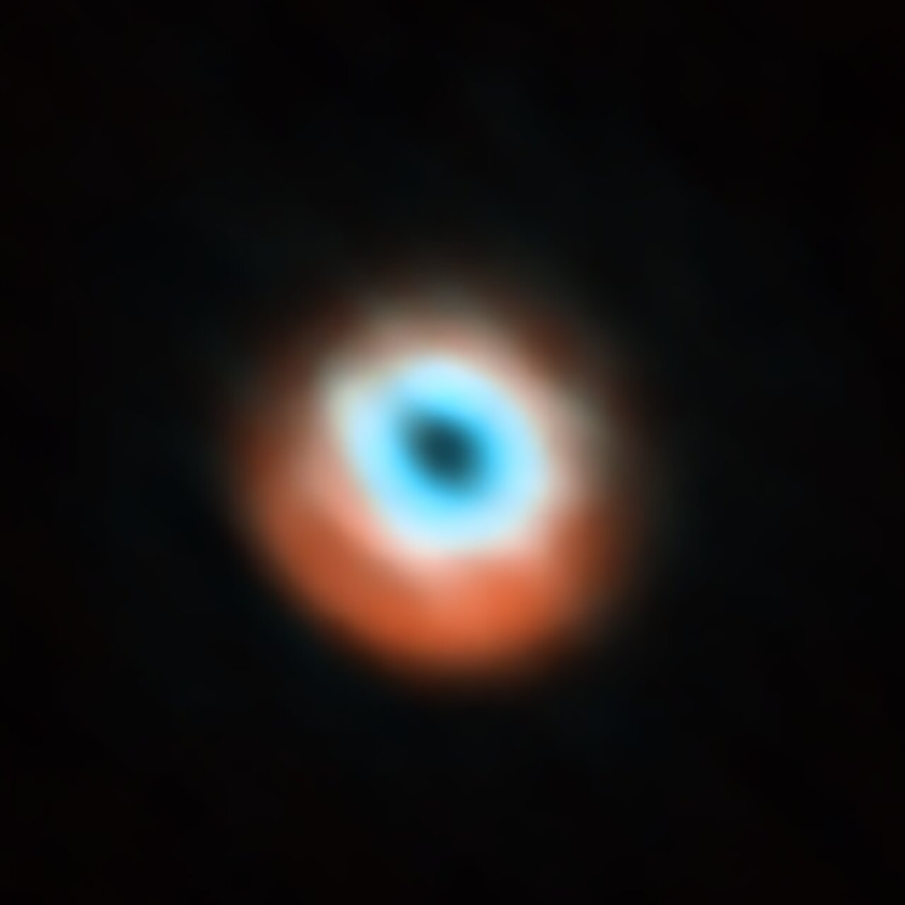 This image, taken with the Atacama Large Millimeter/submillimeter Array (ALMA), and first released in 2015, shows a planet-forming disc around the young star HD 135344B. The image combines a view of both the gas (blue) and the dust (orange) around the star. The star itself is invisible at these wavelengths, and is located in the central gap of the disc. Credit: ALMA (ESO/NAOJ/NRAO)/N. van der Marel et al.