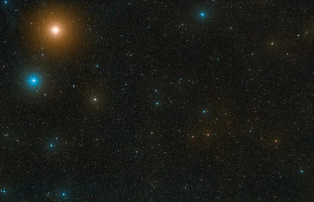 This image from the Digitized Sky Survey (DSS) shows the region of the sky around the star HD 135344B. Right at the centre of the image there are two bright stars close to each other; HD 135344B is the one at the bottom. Credit: ESO/Digitized Sky Survey 2. Acknowledgement: D. De Martin